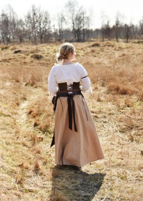 Dos de la jupe unie beige en coton, avec tombé évasé pour reconstitution, GN ou LARP