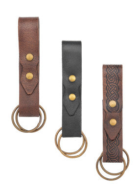 Relève-jupe en cuir présenté en brun, noir et brun embossé, pour tenue de reconstitution, GN ou LARP